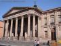 Neo-classical facade with French influences in pink stone, The Theater of Peace- Teatro de la Paz