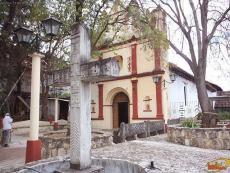 Stone Cross with Indian hieroglyphics in the Atrium of the Temple