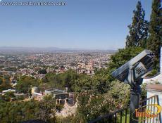 Binoculares de moneda en el mirador