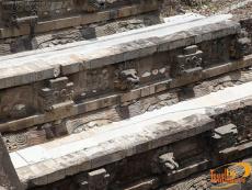 Heads and divine symbols of the god Quetzalcoatl