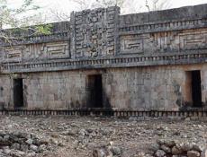 Superimposed masks on the facade
